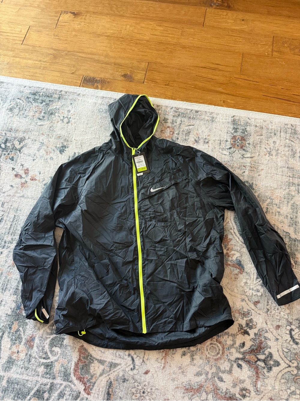 Nike Men’s Black Hooded lightweight Running Jacket with Neon volt Yellow Trim